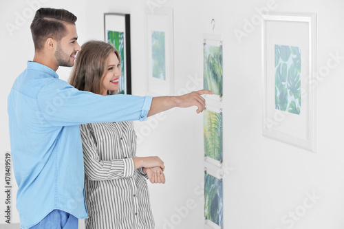 Young couple in art gallery