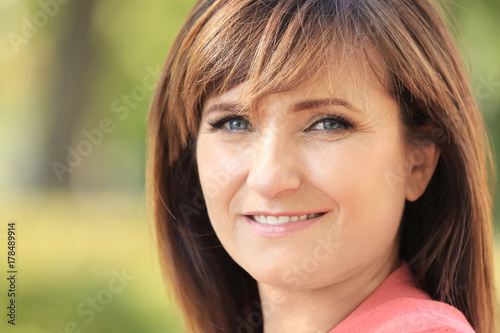 Attractive mature woman out...