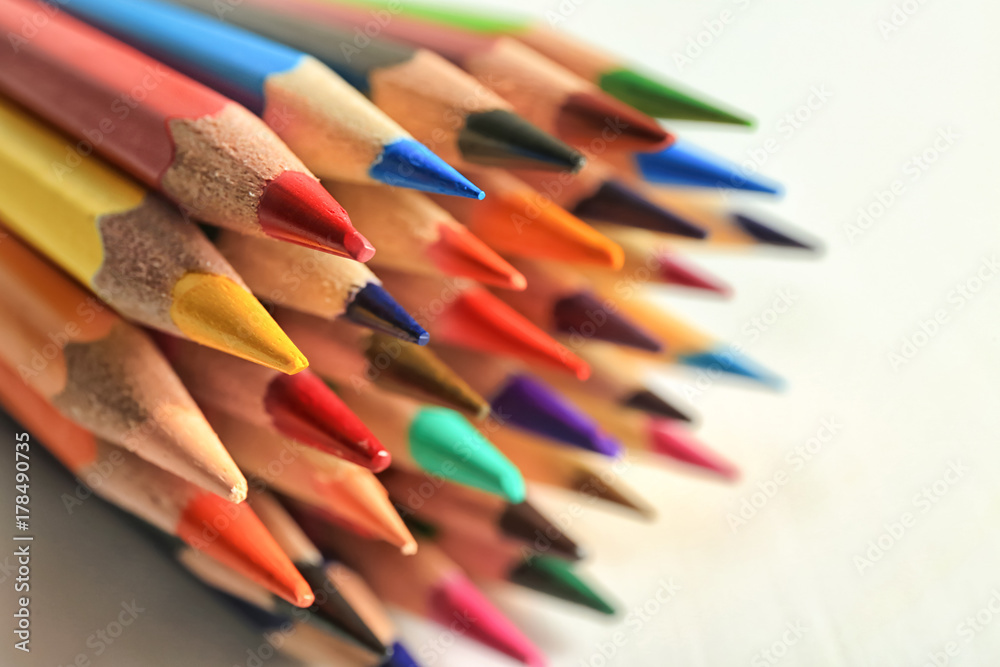 Colorful pencils on light background, close up Colorful pencils on light background, close up