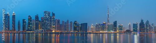 DUBAI  UAE - MARCH 23  2017  The evening panorama over the new Canal with the Downtown and Burj Khalifa tower.