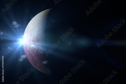 Fototapeta Naklejka Na Ścianę i Meble -  dwarf planet Pluto lit by the distant Sun