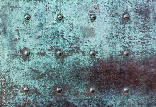 heavy metal iron door texture with patina photo
