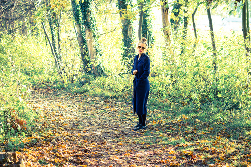 woman going for a walk in the forest