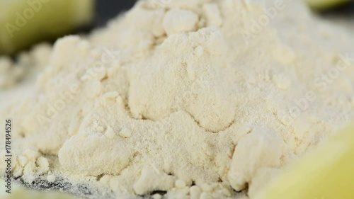 Rotating lemon powder on a vintage background in 4K (seamless loopable)