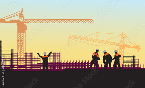 workers are on the last floor of a newly built block of flats