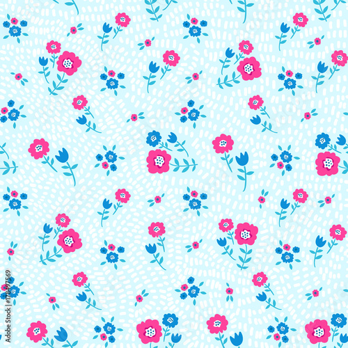 Floral seamless colorful pattern with blue and pink flowers on blue speck background. Ditsy print. Elegant and tender vector illustration, floral background for print, scrapbooking etc