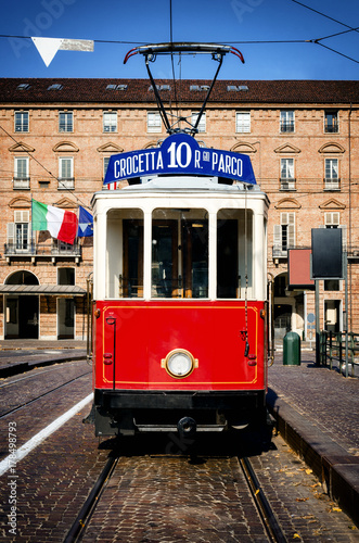 Historical tramway line number ten (from Crocetta to Regio Parco street) stops in Piazza Castello, main square of Turin (Italy) photo