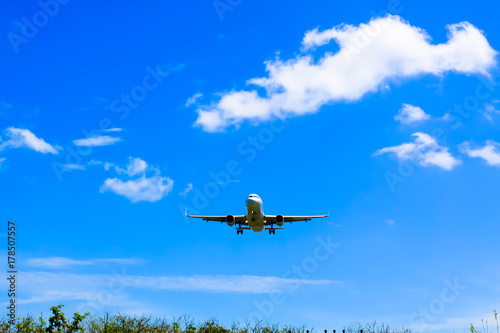 airplane Landing at Phuket International airport in sunny day