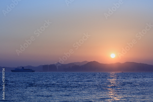 Sunset with sea and mountains