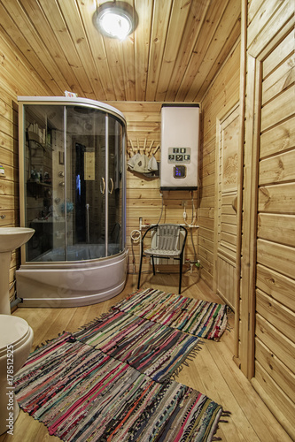 Obraz na płótnie wooden rustic bathroom with modern equipment w salonie