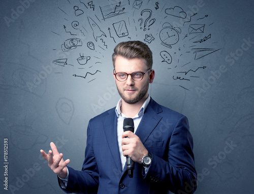 Businessman holding microphone