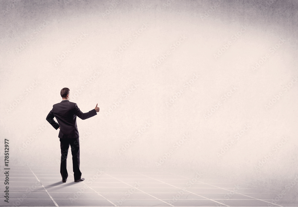Business person standing in empty space Business person standing in empty space