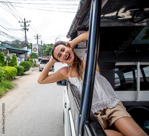 the girl in the taxi tuk-Tuk photo