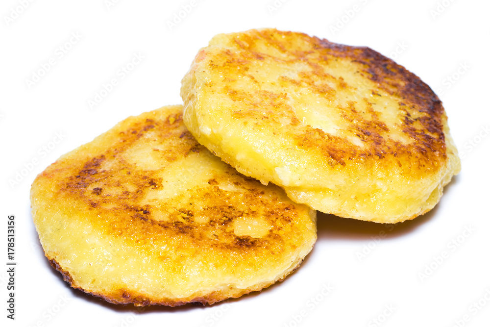 freshly baked cottage cheese pancakes isolated on white