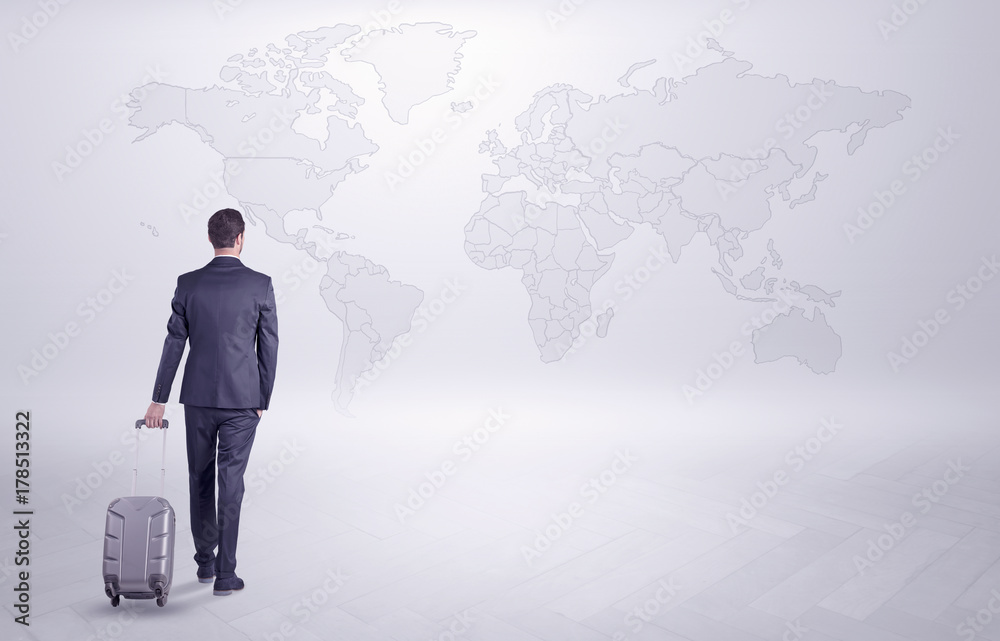Businessman planning his trip over the world Businessman planning his trip over the world