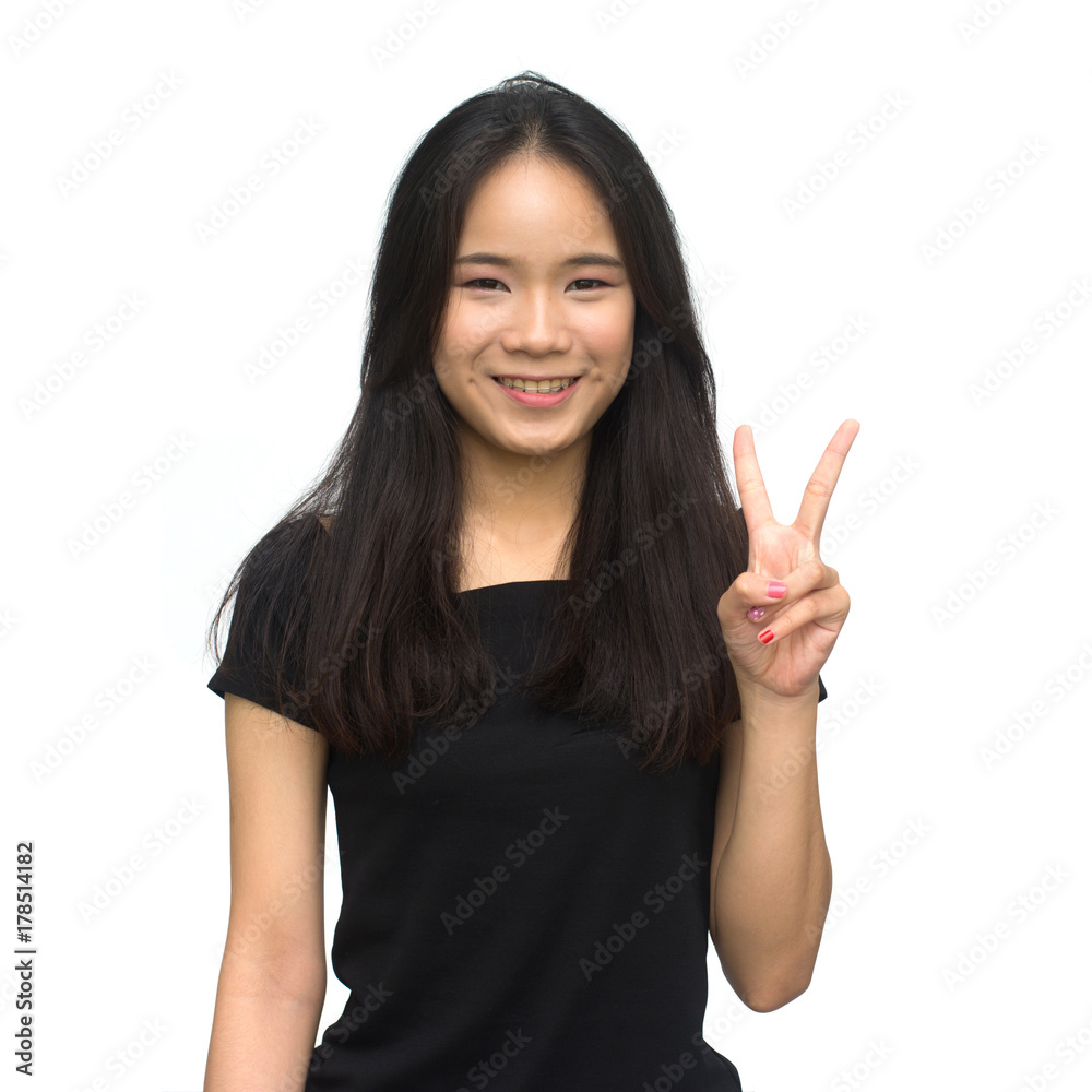 Happy asian girl counting to seven isolated on white background Happy asian girl counting to seven isolated on white background