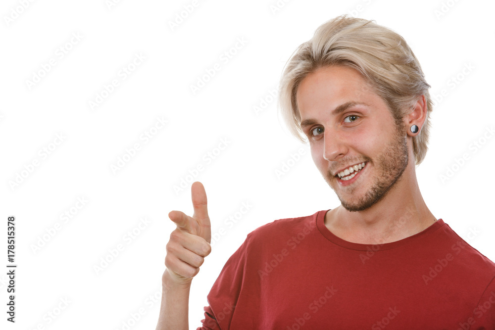 young man laughing pointing with fingers young man laughing pointing with fingers