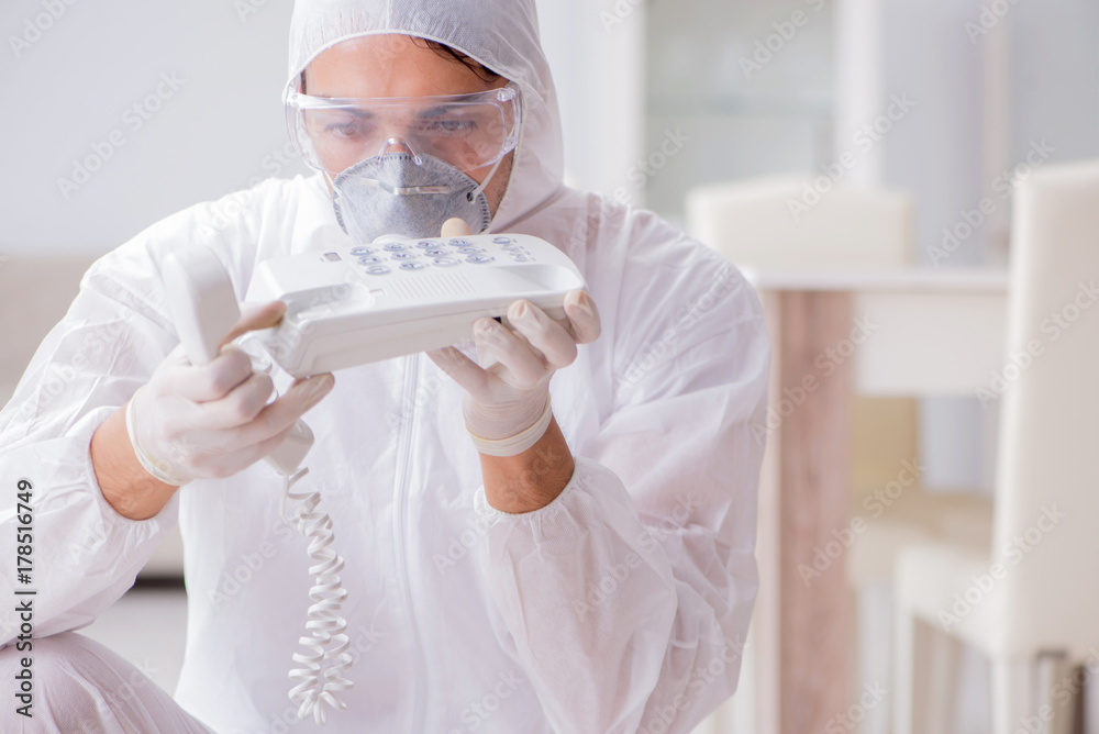 Forensic expert at crime scene doing investigation Forensic expert at crime scene doing investigation