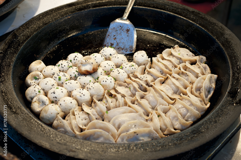 Shanghai-style pan-fried meat buns, Shanghai, China Shanghai-style pan-fried meat buns, Shanghai, China