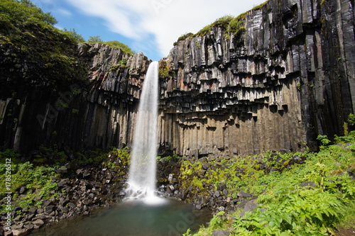 Svartifoss waterfall surrounded by dark lava columns,Iceland