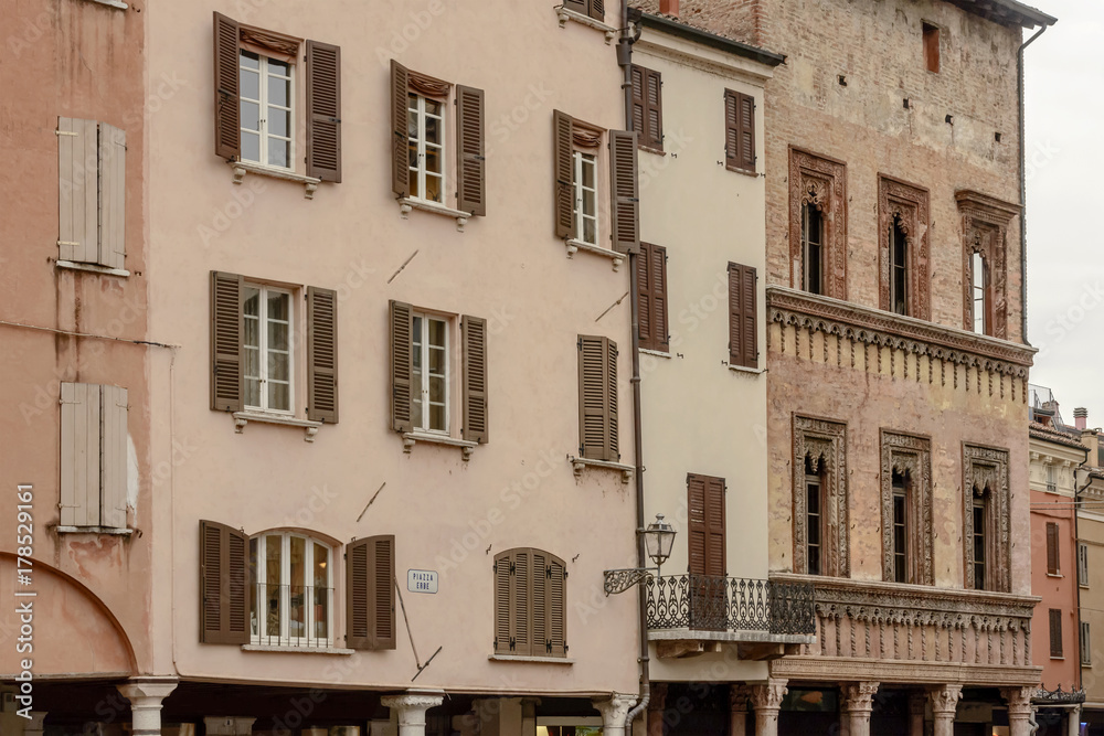 facades of Renaissance buildings on Erbe square, Mantua, Italy