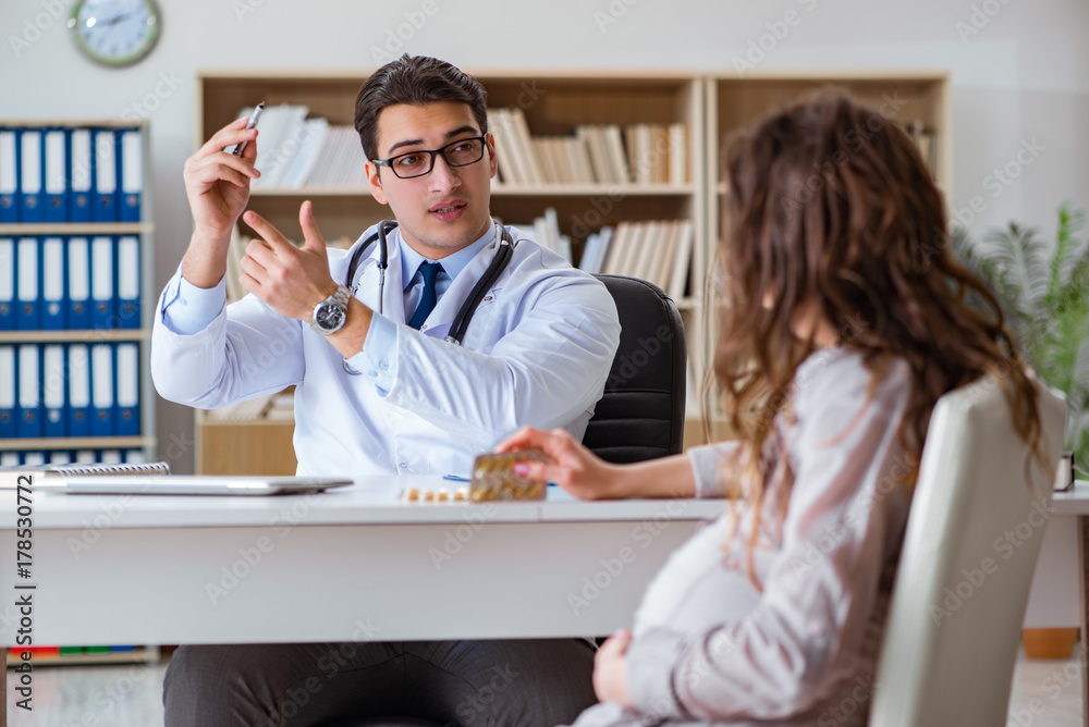Pregnant woman visiting doctor for consultation Pregnant woman visiting doctor for consultation