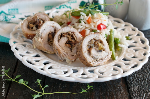Pork meat rolls stuffed with mushrooms and cheese