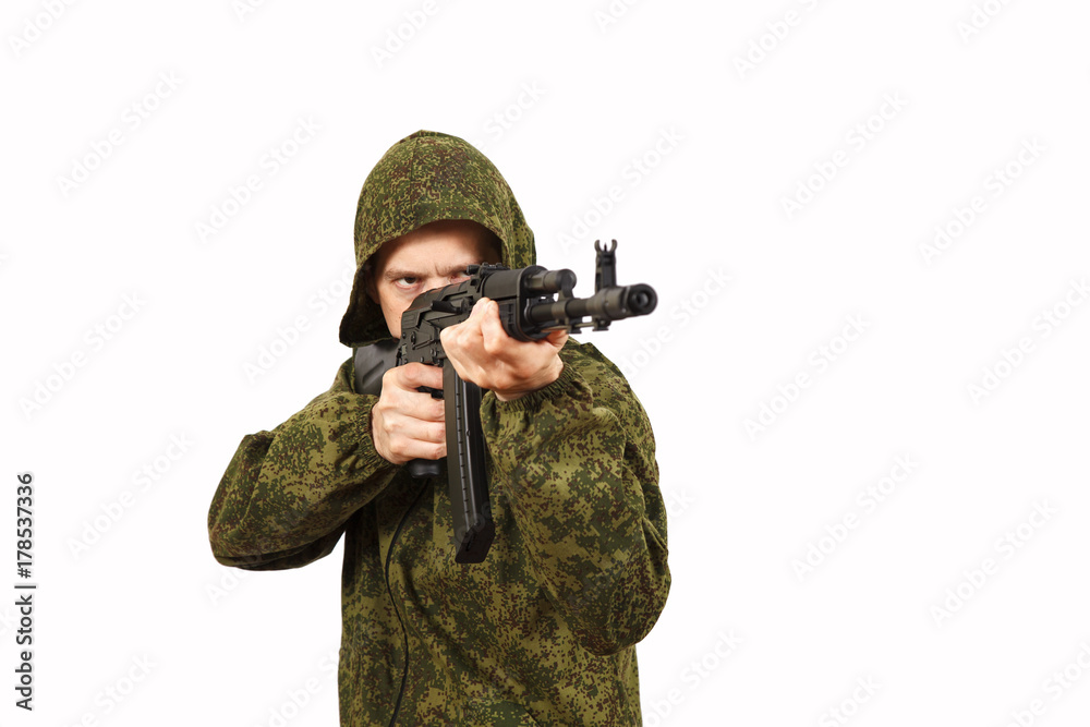 Fototapeta premium The man in a mask and a submachine gun in hands