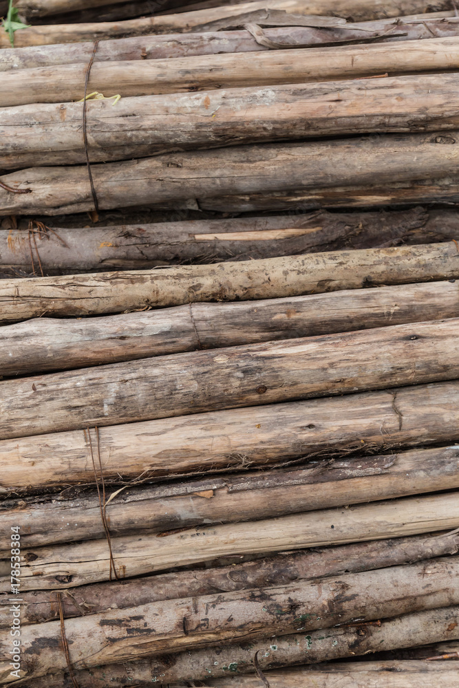 old round log wood pile stack for fireplace texture background old round log wood pile stack for fireplace texture background