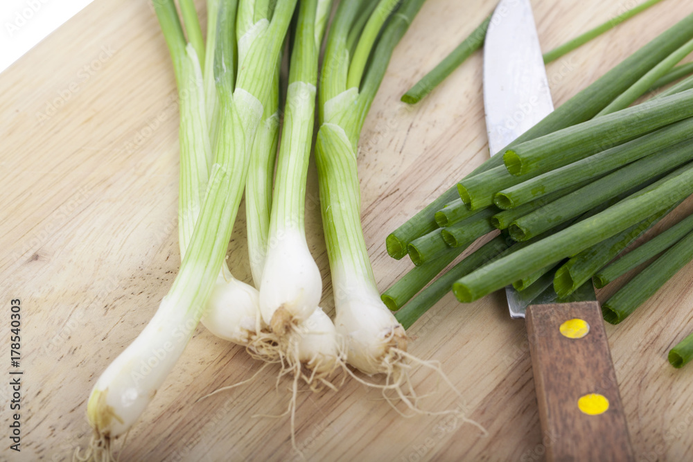 Chopped fresh green onions isolated on white background Chopped fresh green onions isolated on white background