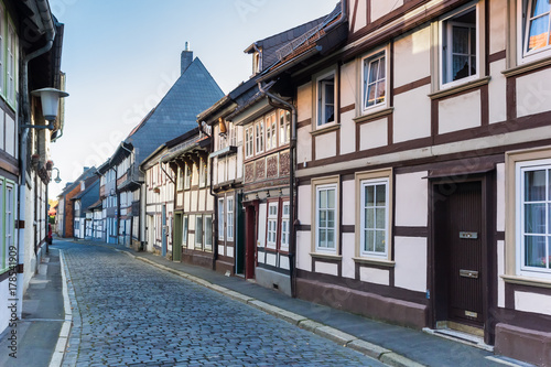 Cobblestoned street with half-timbered houses in the center of Goslar