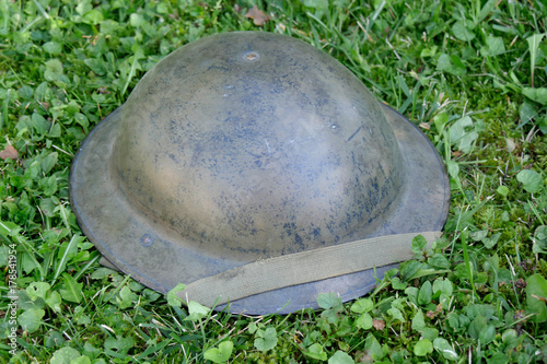 wwii british helment on the grass