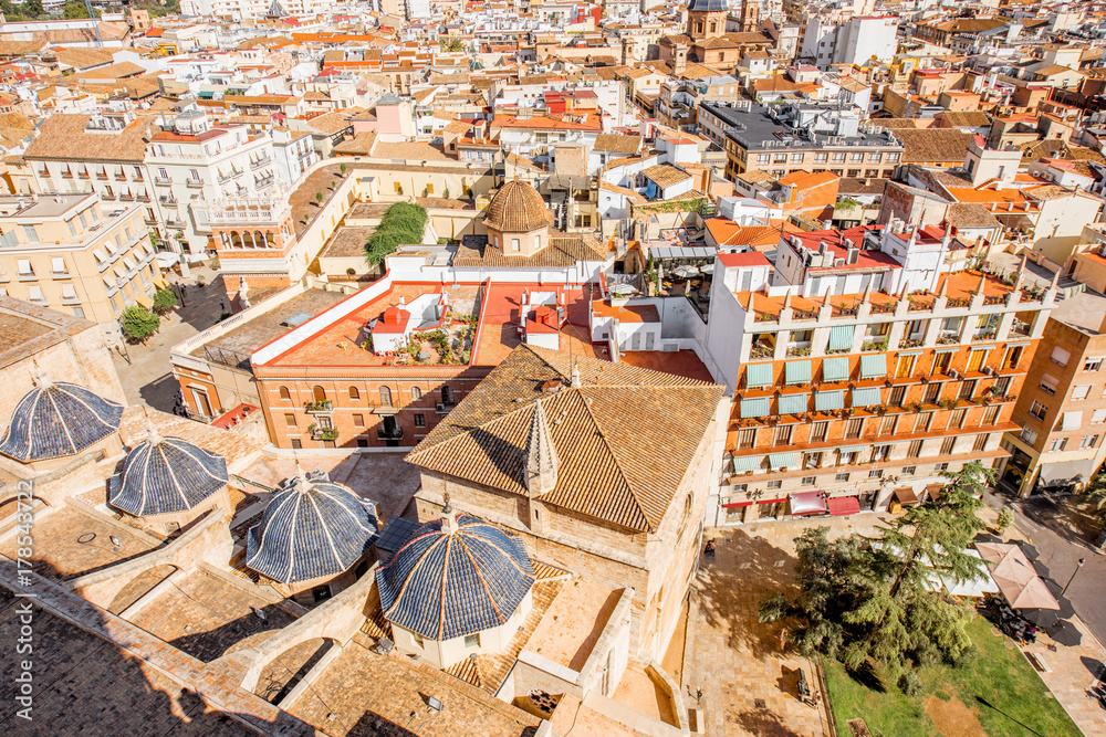 Fototapeta premium Top cityscape view on the old town with Basilica of our Lady of the Forsaken in Valencia city during the sunny day in Spain