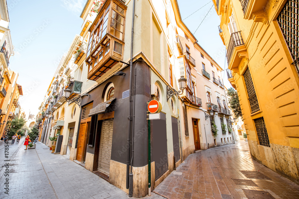 Fototapeta premium View on the beautiful street crossing at the old town of Valencia city in Spain