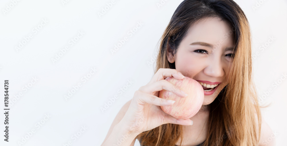Health lifestyle concept - Beautiful young woman hold red apple with smile. Isolated over white background, asian Health lifestyle concept - Beautiful young woman hold red apple with smile. Isolated over white background, asian