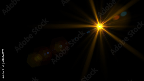 Lens flare light over black background. Easy to add overlay or screen filter over photos