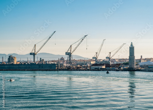 cranes and shipyards in Livorno harbor. Tuscany, Italy. © GiorgioMorara