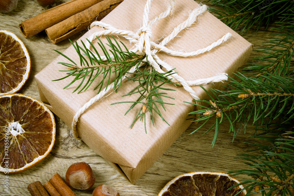 Christmas gifts in rustic boxes on wooden background. Christmas gifts in rustic boxes on wooden background.