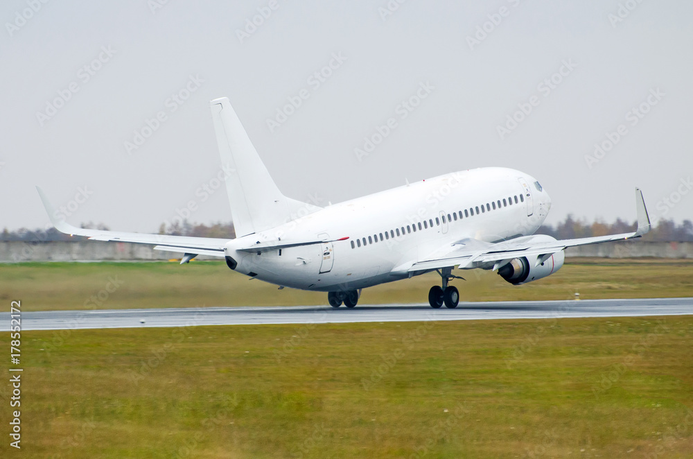 Airplane detaches take off from the runway at the airport. Airplane detaches take off from the runway at the airport.