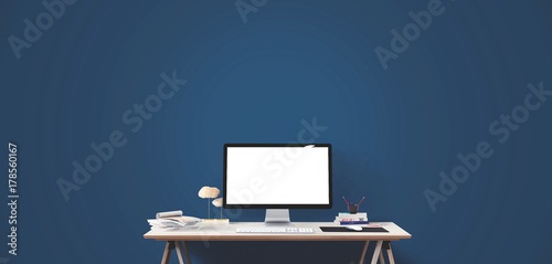 Computer display and office tools on desk. Desktop computer screen isolated. Modern creative workspace. Front view.