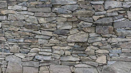 Old stone wall in village