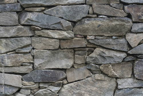Old stone wall in village