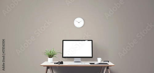 Computer display and office tools on desk. Desktop computer screen isolated. Modern creative workspace. Front view.