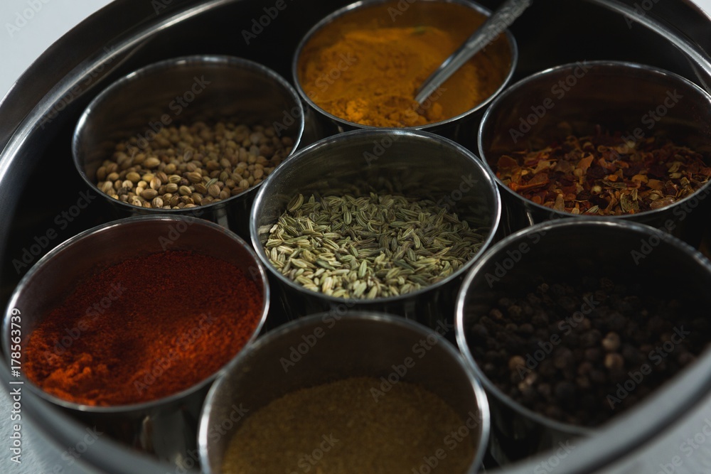 Typical spice box with multiple containers Typical spice box with multiple containers