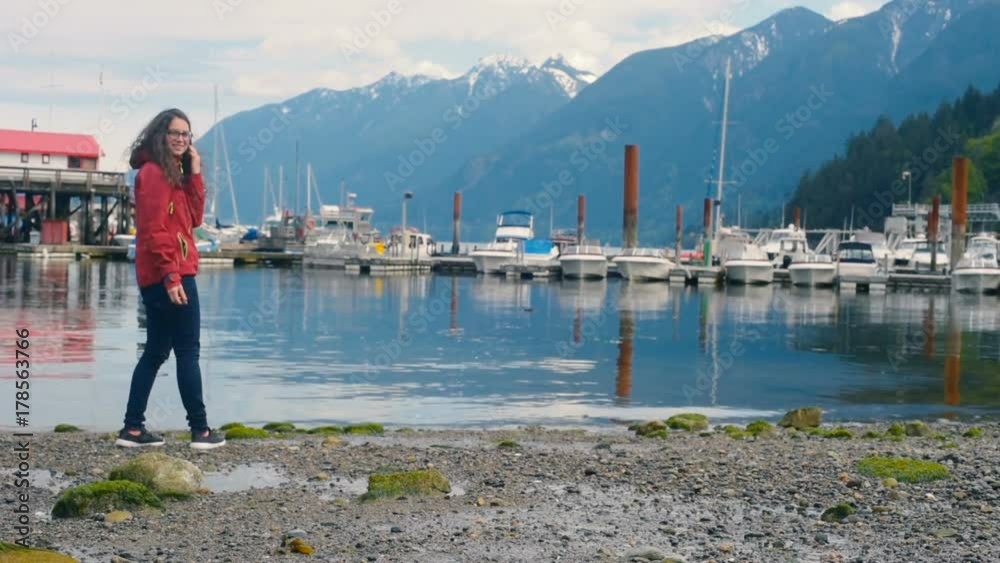 young woman enjoying beautiful view in Horseshoe Bay, Canada, BC young woman enjoying beautiful view in Horseshoe Bay, Canada, BC