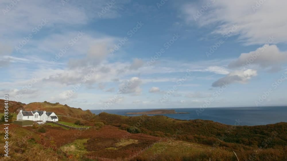 Highlands in Scotland - white house near sea - mountain landscape, time-lapse Highlands in Scotland - white house near sea - mountain landscape, time-lapse