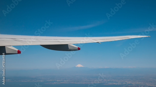 A view from the airplane window while flying over Mt. Fuji.