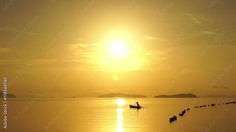 Beautiful sunrise or sunset over tropical sea in phuket thailand Beautiful sunrise or sunset over tropical sea in phuket thailand