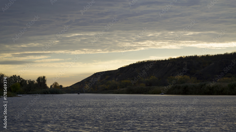Beautiful sunset over the river.Travels. Fishing Beautiful sunset over the river.Travels. Fishing