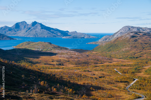 Norwegian mountain scenery with sea and curvy road